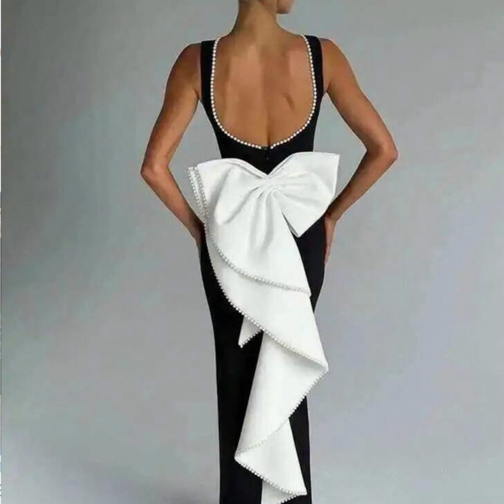 Elegant Black Evening Gown with White Statement Bow